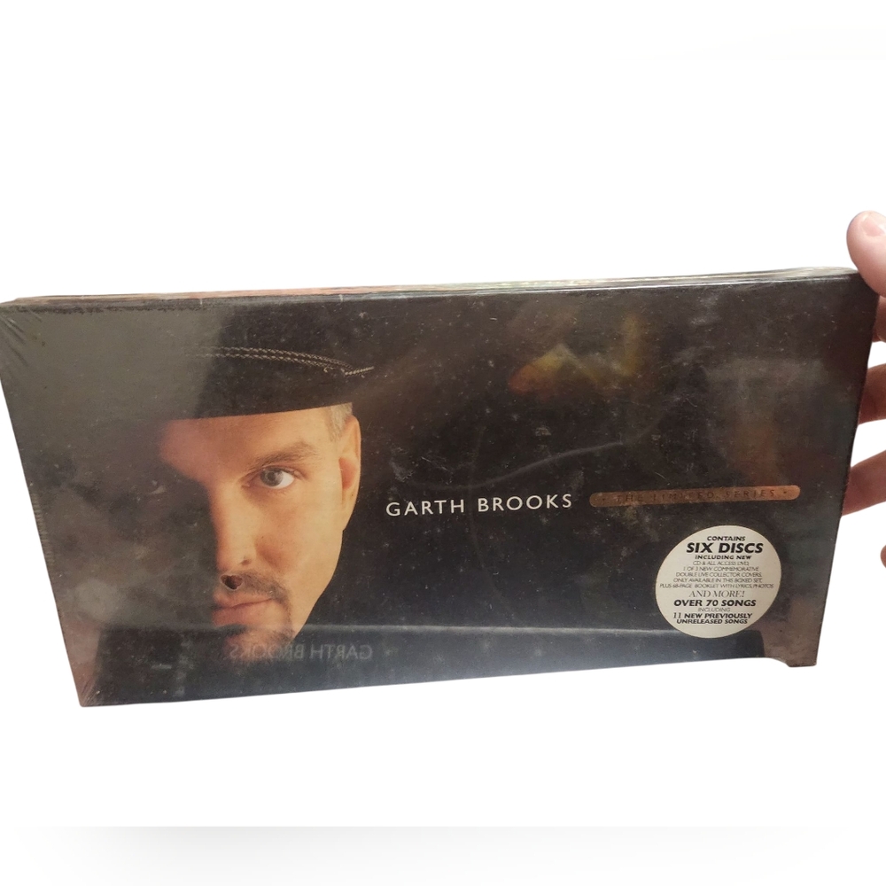 Garth Brooks Six Disc Set And The Book Titled The First 5 Years With 5 Disc